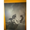 Image 1 : The image displays the artwork "Eva with Rose" (1988) by renowned photographer Horst P. Horst. This 
