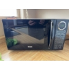 Image 2 : RCA brand microwave oven in black finish. Features digital control panel and turntable. Includes pre