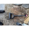 Image 1 : heavy-duty gardening fork, likely used for breaking up clods, loosening, lifting, and turning over s