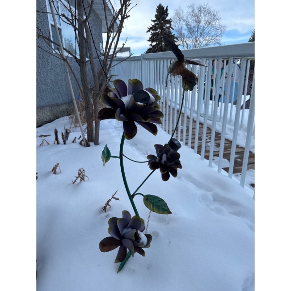  metal garden flower stake designed for outdoor decoration. 
