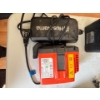 Image 1 :  Husqvarna BLi20 36V 4Ah Lithium-Ion Battery and its corresponding charger. 
Capacity: 144 Wh (4.0 A