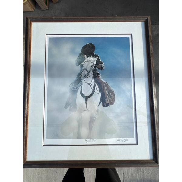 Framed cowboy on a horse. Eye of the storm Number 708 of 1000. Signed. 