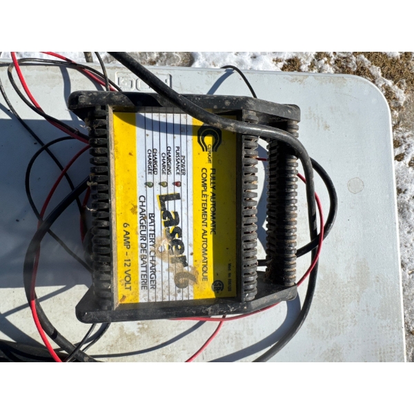 Cliplight Laser Model 106120 battery charger.
Type: 6 Amp - 12 Volt fully automatic battery charger.