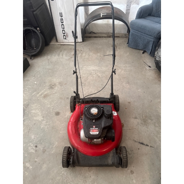 Yard Machines 21-inch push lawn mower powered by a 158 cc engine. 2-in-1 capabilities for mulching o