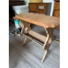 Image 3 : Wooden side table featuring a rectangular top with beveled edges and a decorative cutout base. The t