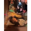 Image 2 : Several dolls in traditional German regional costumes, labeled "Westerland" and "Hamburg," housed in
