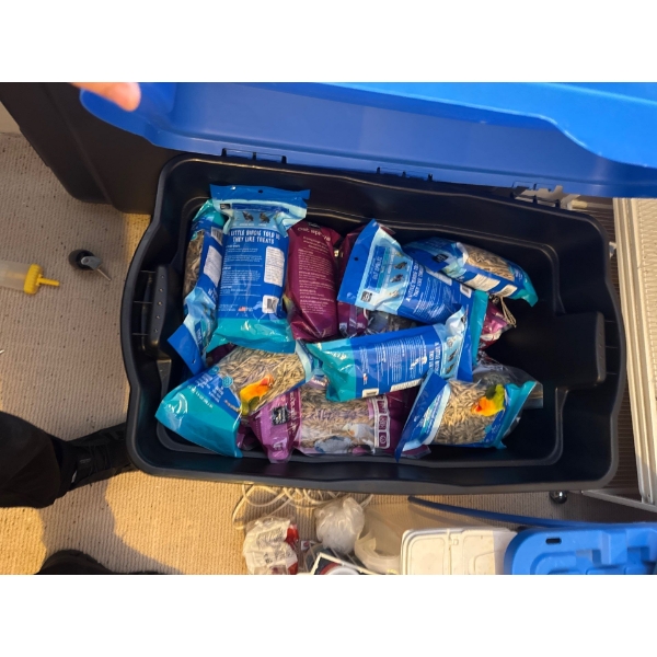 Full Tupperware container of bird supplies, lots of bird oat sprays, Rubbermaid Tupperware container