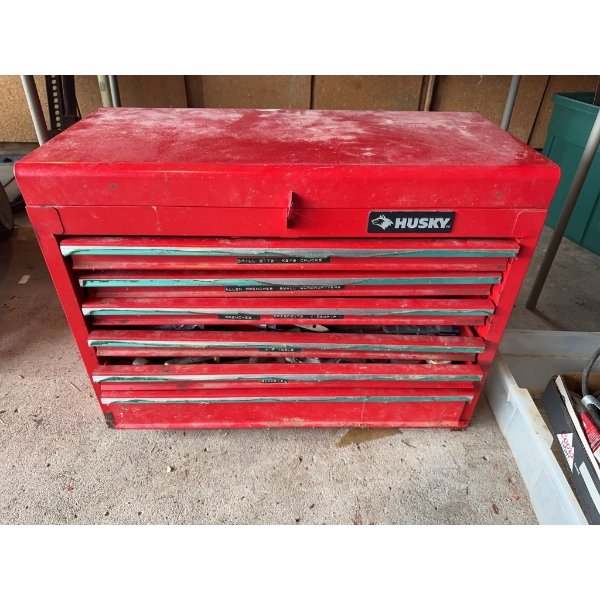 Husky tool box that comes full of various tools. The tool box and its full contents are included as 