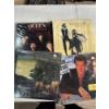 Image 1 : 4 vintage records including Randy Travis and Queen