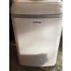 Image 1 : This is a KoolKing portable air conditioner, model MPPD-14HRNT-BHS. 
It functions as an air conditio