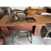 Image 13 : Singer treadle sewing machine, serial number 16165557, featuring original cast iron base and wooden 