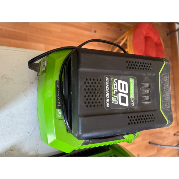  80V lithium-ion batteries for outdoor power equipment. 
The charger features a built-in fan for coo