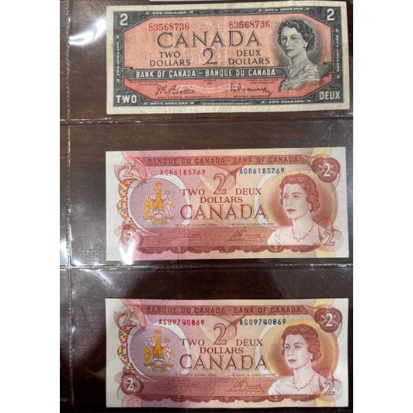  vintage Canadian two-dollar bills featuring Queen Elizabeth II.
