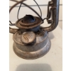Image 3 : Metal Dietz kerosene lantern. The lantern shows signs of use and age and includes an attached wire h