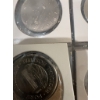 Image 17 : Canadian coins, featuring commemorative dollar coins and 50 cent pieces. Notable coins include a 197