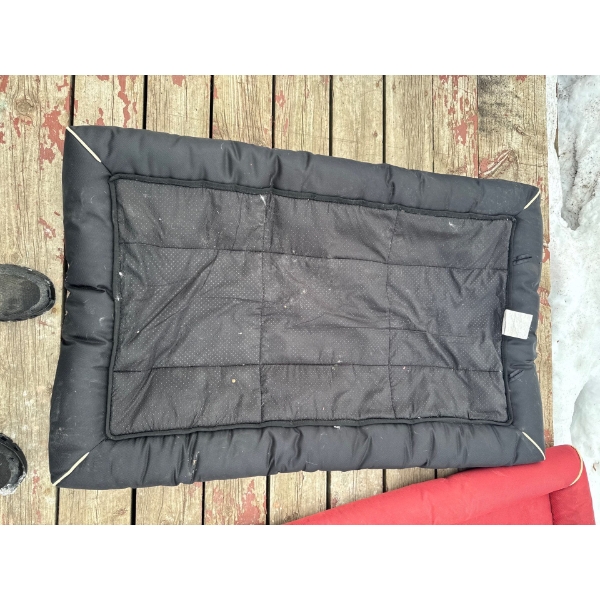 rectangular dog bed or crate mat designed for indoor or outdoor use, featuring a reversible design f