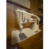 Image 2 : Singer, sewing machine and clock, Elkridge crafts clock, and made in Alberta antique sewing desk and