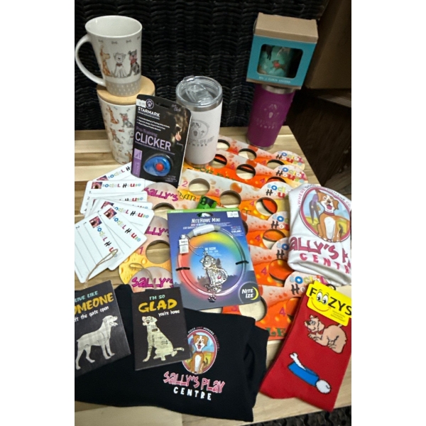 Collection of assorted doggy merchandise from Sally’s place centre brand, new coffee, mugs, socks, l