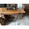 Image 5 : Singer treadle sewing machine, serial number 16165557, featuring original cast iron base and wooden 