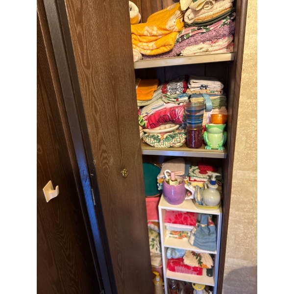 Bathroom closet, all linens included. Everything in closet included.