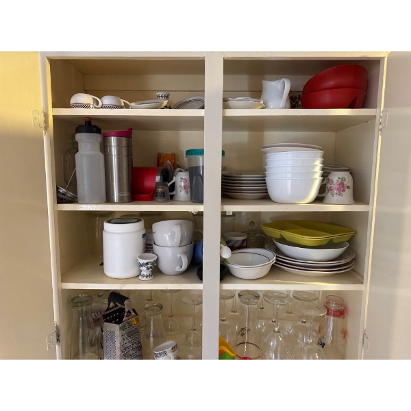 All items on the right side of the sink in the upper cupboards are all included. Plate ware, water b