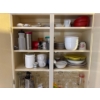 Image 1 : All items on the right side of the sink in the upper cupboards are all included. Plate ware, water b