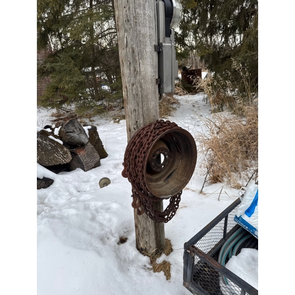 Long steel chain, likely used for tractor or truck traction, possibly heavy transport chains
