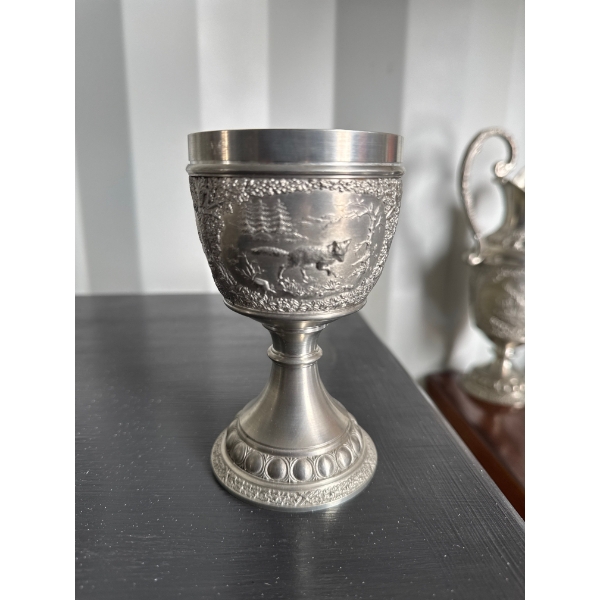 This item is a vintage German SKS 95% Zinn (Tin) Pewter Goblet featuring an embossed countryside sce