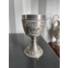 Image 1 : This item is a vintage German SKS 95% Zinn (Tin) Pewter Goblet featuring an embossed countryside sce