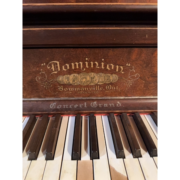 Dominion Concert Grand upright piano made by the Dominion Organ & Piano Co., Bowmanville, Ontario. I