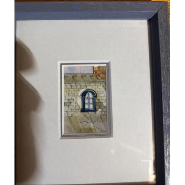  Painting depicting a small blue arched window on a stone brick wall, likely a watercolor on paper.