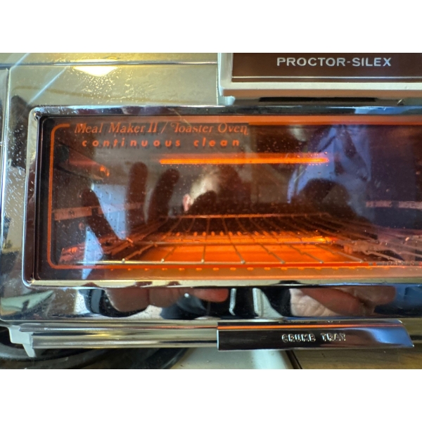 This is a vintage Proctor-Silex Meal Maker II / Toaster Oven. 
It functions as an oven, broiler, and