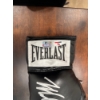 Image 4 :  Mike Tyson autographed black Everlast boxing glove. 
Signed Item: A black Everlast boxing glove han