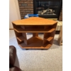 Image 1 : corner television stand is designed for small spaces, featuring a teak finish and a hexagonal shape 