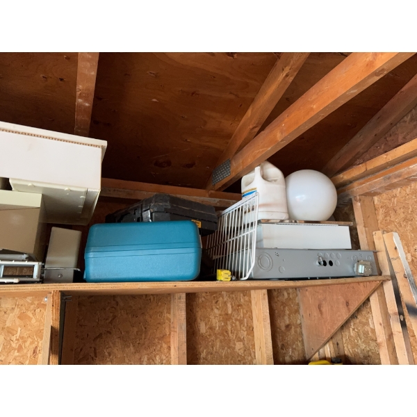 All items located in the corner, including various containers, household equipment, and miscellaneou