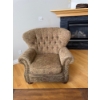 Image 1 :  traditional-style armchair featuring a tufted wingback design, rolled arms, and decorative nailhead