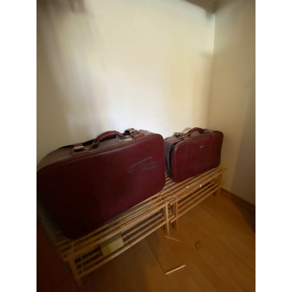  Wooden shoe racks  52 1/2 inches long 13 inches high and leather suitcases and all contents in clos