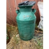 Image 3 : Two metal milk cans. One is decorated with hand-painted flower designs, and the other is solid green
