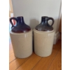 Image 1 :  Antique two-tone stoneware jugs, which were commonly used for storing liquids such as whisky, cide