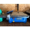 Image 1 : This item is a Mastercraft 7-Inch 5 Amp Wet Tile Saw. 
It features a 5 Amp motor generating speeds u