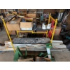 Image 4 : Two green metal drywall panel lifts, equipped with warning labels and hand cranks. Ideal for lifting