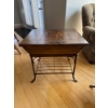 Image 1 :  vintage side table featuring a traditional American dough box on a wrought iron stand.