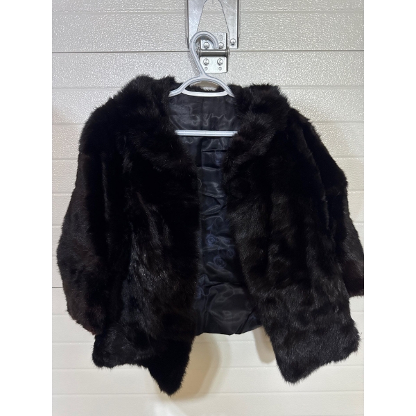 Luxurious small fur coat.