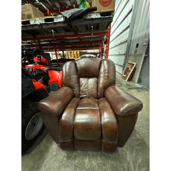 Very nice lazy boy reclining rocking leather chair. Swivels