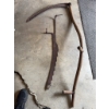 Image 5 : Traditional scythe with a wooden handle and metal blade, along with a metal adjustable hay rake atta