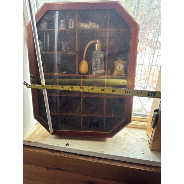  vintage display case designed to hold small collectibles, commonly known as a shadow box or a print