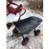 Image 1 : VEVOR Poly Garden Dump Cart, specifically a model capable of hauling up to 600 lbs. 
Capacity: It ha