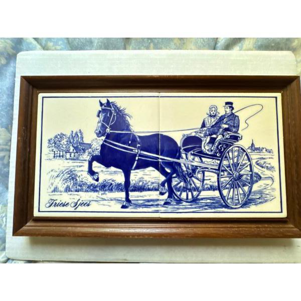 This is a vintage Delft blue tile panel featuring a Frisian horse pulling a traditional Dutch carria