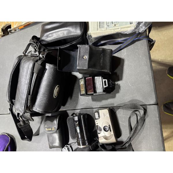 Vintage camera gear, Minolta flash, HP ten eighty digital camcorder, Kodak advantage 1,600 auto came