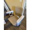 Image 2 : This is a straight rail stairlift, designed to help individuals with mobility challenges navigate st